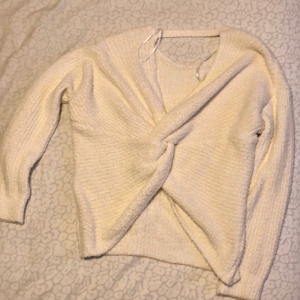 Never been worn, twist back sweater. Size L
